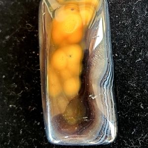 New Yellow Black Fire Agate Oblong Pendant.